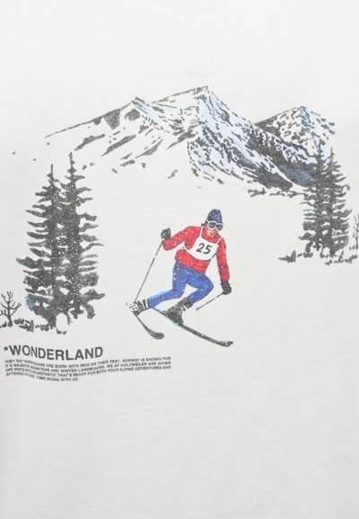 Grafické tričko s motívom lyžiara v červenej a modrej na bielom pozadí, so zasneženými horami a stromami. Text znie "WONDERLAND."