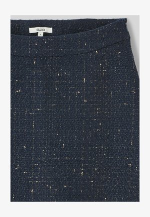 Jupe en tissu texturé bleu marine avec des paillettes dorées métalliques ; dotée d'une taille lisse et d'une silhouette droite. L'étiquette de taille indique "S".
