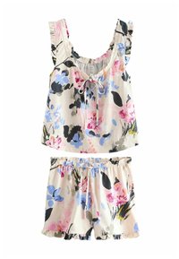 Bloemenprint tweedelig outfit met een mouwloos topje met ruches aan de bandjes en een trekkoord, gecombineerd met een korte broek, beide in pastelkleuren en zachte stof.