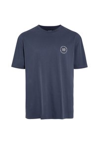 Navy blue T-shirt made of soft fabric, featuring a round graphic with text on the left chest area. Classic crew neck and short sleeves.