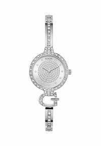 Montre en acier inoxydable argenté avec un cadran circulaire, accents de strass et un fermoir décoratif en forme de G. Présente un cadran minimaliste et une texture scintillante.