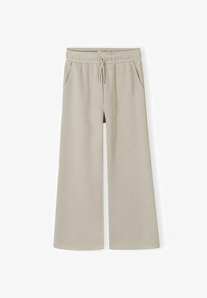 Beežid laiajalgsed püksid elastse vöökoha ja nööriga, esitaskud, pehmest kangast.