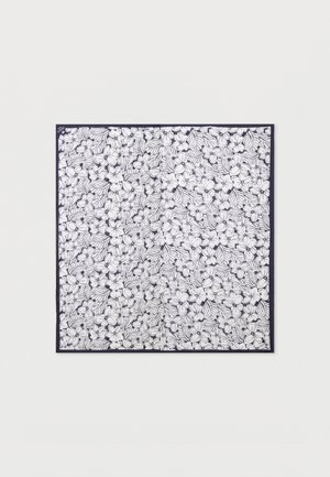 Square fabric with dense black and white floral pattern featuring flowers and leaves and a thin black border.