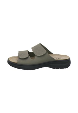 Beige open-toe slide sandal with two adjustable velcro straps and cushioned black sole for comfort and support.