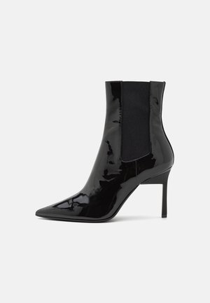 Bottines à talons hauts - black