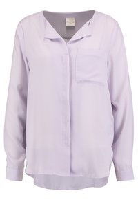 Blusa de manga larga lila hecha de tejido suave, con cuello con muesca, bolsillo frontal y dobladillo redondeado. Diseño minimalista con un brillo sutil.