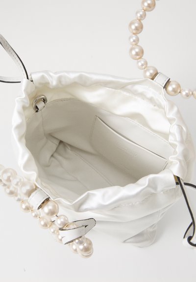 White satin bag with a drawstring closure and pearl accents on the handles. Smooth texture, soft shape, and unlined interior.