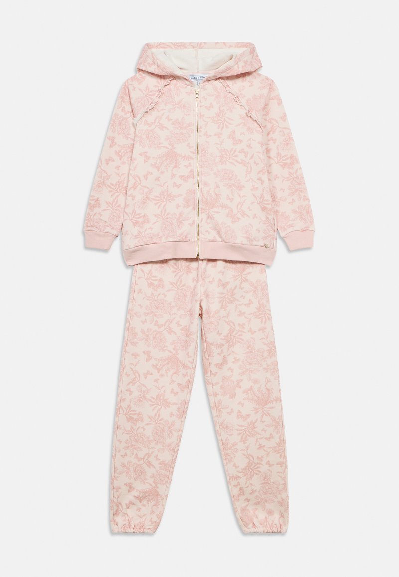 Σετ ανοιχτό ροζ φούτερ με κουκούλα και παντελόνι με λουλουδάτο σχέδιο, μαλακό ύφασμα, κλείσιμο με φερμουάρ και ελαστικά μανσέτες στα μανίκια και στους αστραγάλους.