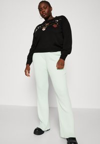 Vero Moda Curve VMGARLAND XMAS - Strickpullover - black