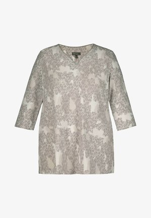 Grå og creme mønstret tunika med V-hals, trekvartærmer og en løs pasform. Fremstillet af letvægtsstof med en blød tekstur.