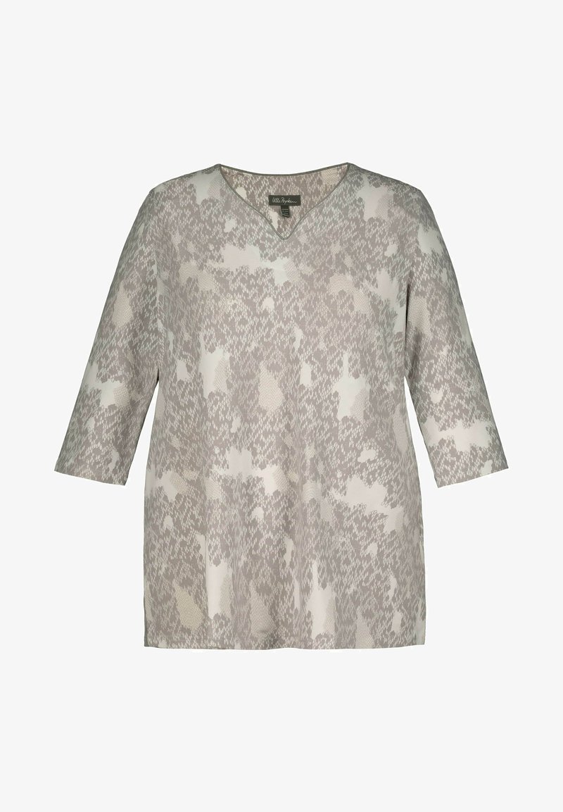 Tunika grigia e crema con motivo, scollo a V, maniche a tre quarti e taglio morbido. Realizzata in tessuto leggero con una consistenza morbida.