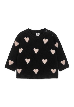 Jersey de punto negro de manga larga con patrones de corazones rosa pálido y dos botones negros en el cuello del hombro izquierdo.