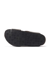 Brown leather sandal with a textured black rubber sole, featuring embossed geometric patterns and a wide strap design.