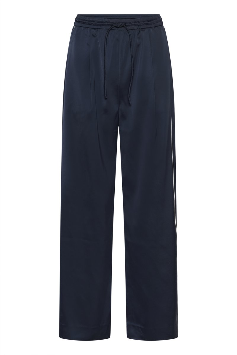 Marineblaue Hose mit lockerem Schnitt aus glattem Stoff, mit elastischem Bund und Kordelzug sowie praktischen Seitentaschen.