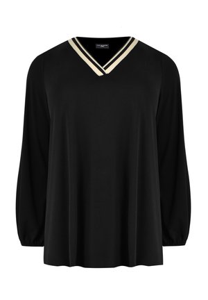 Blusa negra de manga larga con escote en V con doble rayas beige y negras, corte holgado y puños elásticos.