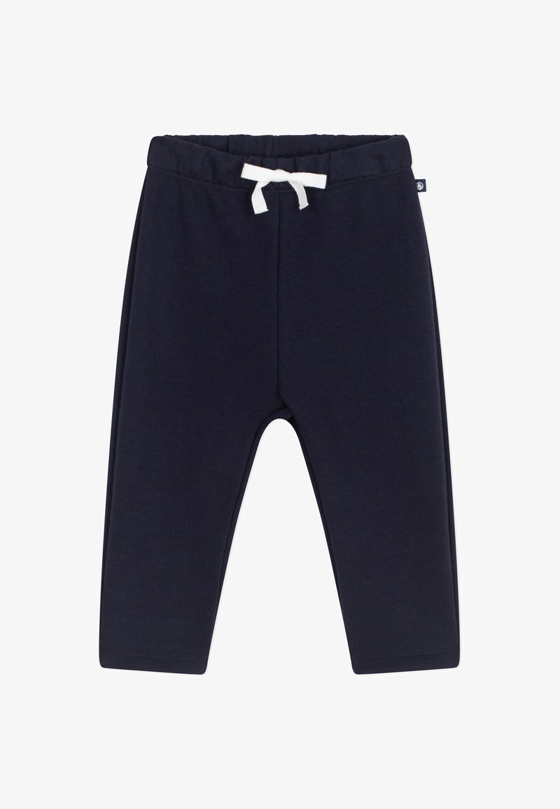 Μπλε ναυτικό βαμβακερό παντελόνι jogger με ελαστική ζώνη μέσης και λευκό κορδόνι. Διαθέτει στενή εφαρμογή και δεν έχει εμφανείς τσέπες.