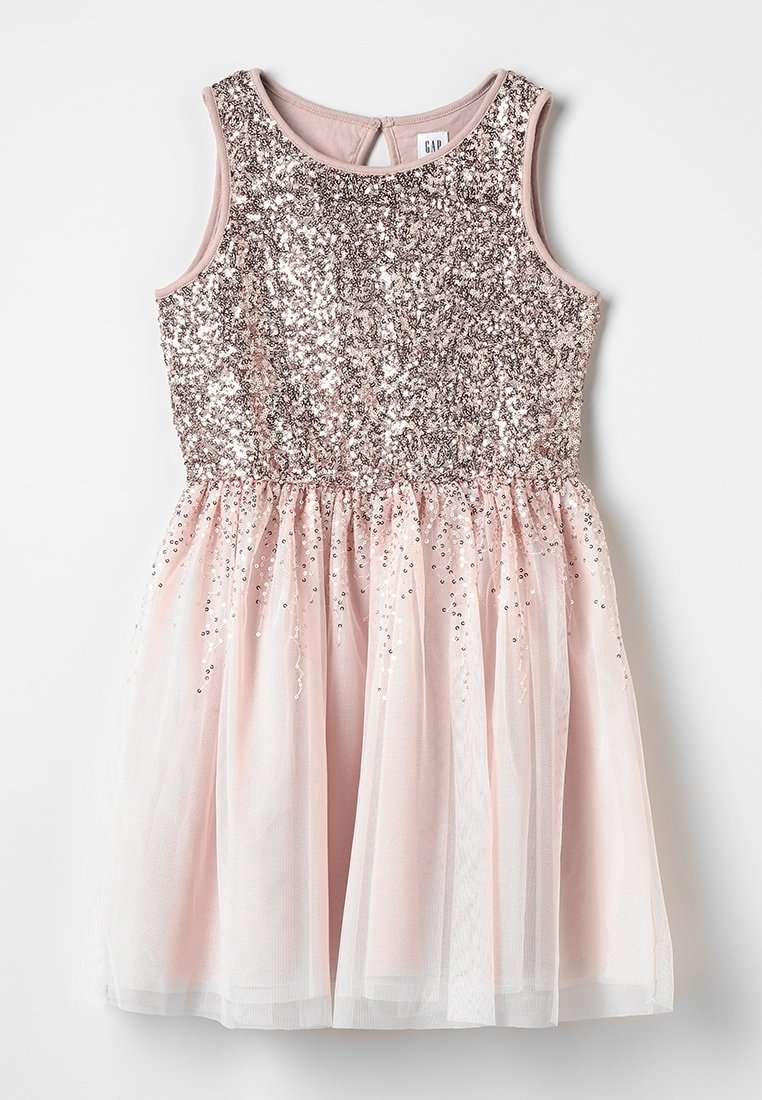 Robe rose sans manches avec un corsage à paillettes et une jupe en tulle doux ornée de paillettes éparses.