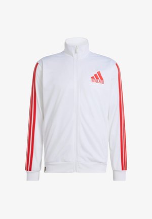 Veste de sport blanche à fermeture éclair avec des rayures rouges le long des manches et un logo "England" rouge sur le côté gauche de la poitrine.