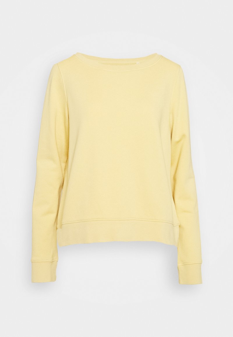 Sweat-shirt uni jaune clair à manches longues avec encolure ras-du-cou, présenté sur fond blanc, sans logos ni motifs visibles.
