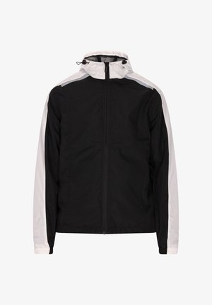 Sort jakke med hvide detaljer, fuld lynlås, høj krave, elastiske cuffs og et let stof. Har en mesh-foring for åndbarhed.