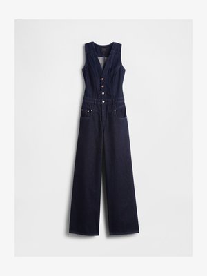 Temno modra bombažna obleka z globokim V-izrezom, brez rokavov, s petimi gumbi spredaj in širokimi hlačnicami. Ima dva stranska žepa.