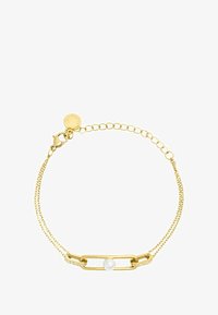 Seleccionado, gold-coloured