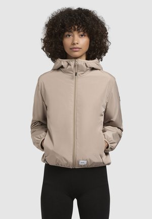 Beige lightweight jacket with a hood, front zipper, and elastic cuffs. Smooth texture, minimalistic design, and subtle logo detail at hem.