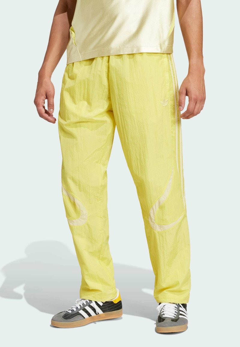 adidas Originals - ADICOLOR 2000S WOVEN TRACK LOOSE - Tracksuit bottoms - pure sulfur   powder yellow, Enlarge