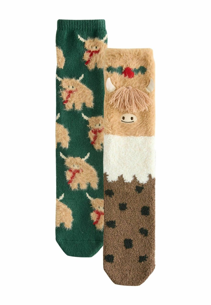 Calcetines hasta la rodilla en verde y marrón. El calcetín izquierdo presenta vacas de las Tierras Altas en beige; el derecho tiene un diseño de vaca peluda con un patrón blanco y marrón.