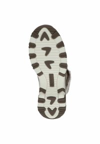 Suela de un zapato con una superficie blanca y texturizada, que presenta empuñaduras de patrón marrón oscuro y una etiqueta en la entresuela que muestra el tamaño 37 y el nombre de la marca.