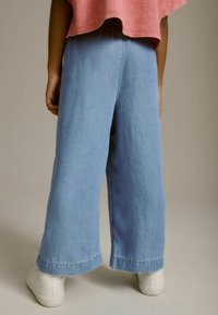 Next WIDE LEG - Flared jeans - light blue denim