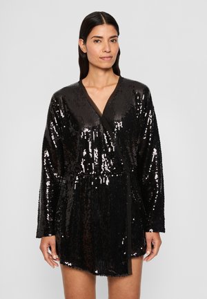 Black sequin wrap dress with long sleeves, V-neckline, and a tie at the waist. The fabric features a shiny, reflective texture.
