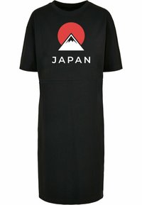 Mustas puuvillane T-särk-kleit, millel on punane päikesegraafika ja valge mägede disain, mille all on tekst "JAPAN". Lühikesed varrukad, mugav lõige.