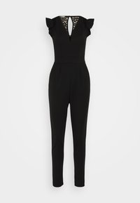 Svart jumpsuit med korta volangärmar, ett spetspanel vid halsringningen, åtsittande midja och avsmalnande ben. Slätt tyg med subtil textur.