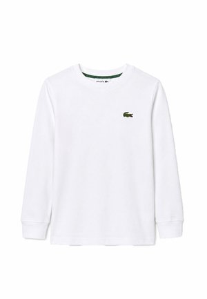 Maglietta bianca a maniche lunghe con scollo tondo, piccolo logo coccodrillo verde sul petto sinistro e polsini a coste.