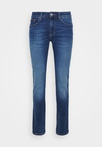 Tmavě modré džíny s rovnými nohavicemi, denimová látka, pět kapes a zapínání vpředu na knoflíky. Vybledlá textura na stehnech.