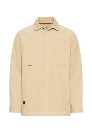 Beige corduroy knoopjacket met twee borstzakken, een kraag en lange mouwen.