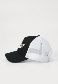Black and white baseball cap with a mesh back, curved brim, and a logo featuring a winged design in yellow and white on the front.