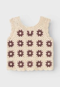 Top all'uncinetto in beige con motivi floreali marrone scuro. Presenta un collo e un orlo scallop, realizzato in filato testurizzato. Design a griglia quadrata.