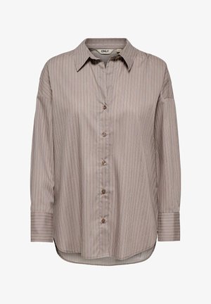 Chemise à manches longues à rayures marron, boutonnée avec col et manches retroussées, étiquetée "ONLY" sur l'étiquette intérieure du col.