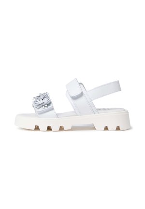Sandalo bianco con suola spessa, cinturini regolabili e decorazioni floreali sulla fascia frontale, vista laterale.