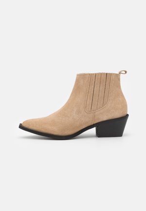 Biker-/cowboynilkkurit - beige