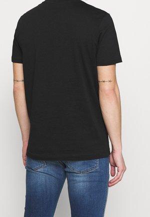 T-shirt con stampa - black