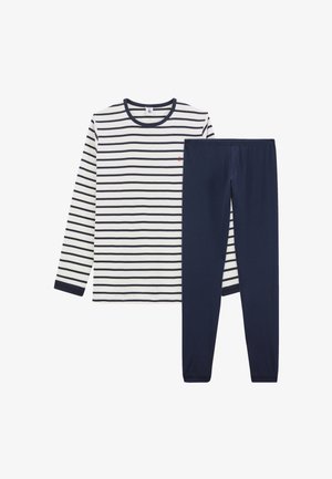 Bílé tričko s dlouhým rukávem s černými horizontálními pruhy, kombinované s jednobarevnými tmavě modrými legínami, položeno na rovný bílý povrch.