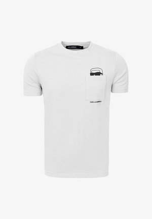 White short-sleeve t-shirt with a chest pocket featuring a black graphic of Karl Lagerfeld's face and sunglasses above the brand name.