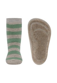 Chaussette rayée verte et beige avec une semelle texturée, présentant des rayures horizontales contrastées et une partie supérieure lisse.