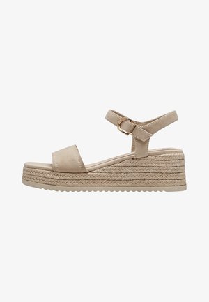 Beige espadrille wedge sandals with a suede upper, adjustable strap, and woven jute sole. Features a flat platform and textured outsole.