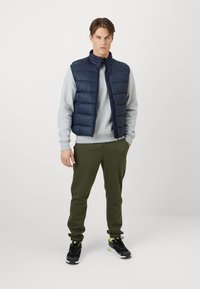 Champion ICONS TONAL CUFF LARGE LOGO - Joggebukse - dark green