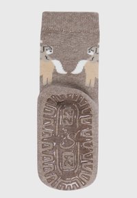 Brown sock featuring cream and light brown sheep designs, with a textured rubber sole for grip and soft knit material.