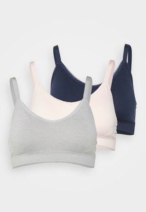 Three bras in grey, light pink, and navy. Cotton blend fabric, seamless design, adjustable straps with a scalloped trim.